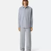 Camicia a maniche lunghe dal taglio comodo con taschino sul petto con bottone. Camicia a maniche lunghe dal taglio comodo con taschino sul petto con bottone.