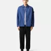 Camicia oversize comoda con tasche laterali e chiusura a scatto Camicia oversize comoda con tasche laterali e chiusura a scatto