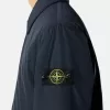 Cappotto imbottito con tasche antiscivolo e con bottoni a pressione Cappotto imbottito con tasche antiscivolo e con bottoni a pressione