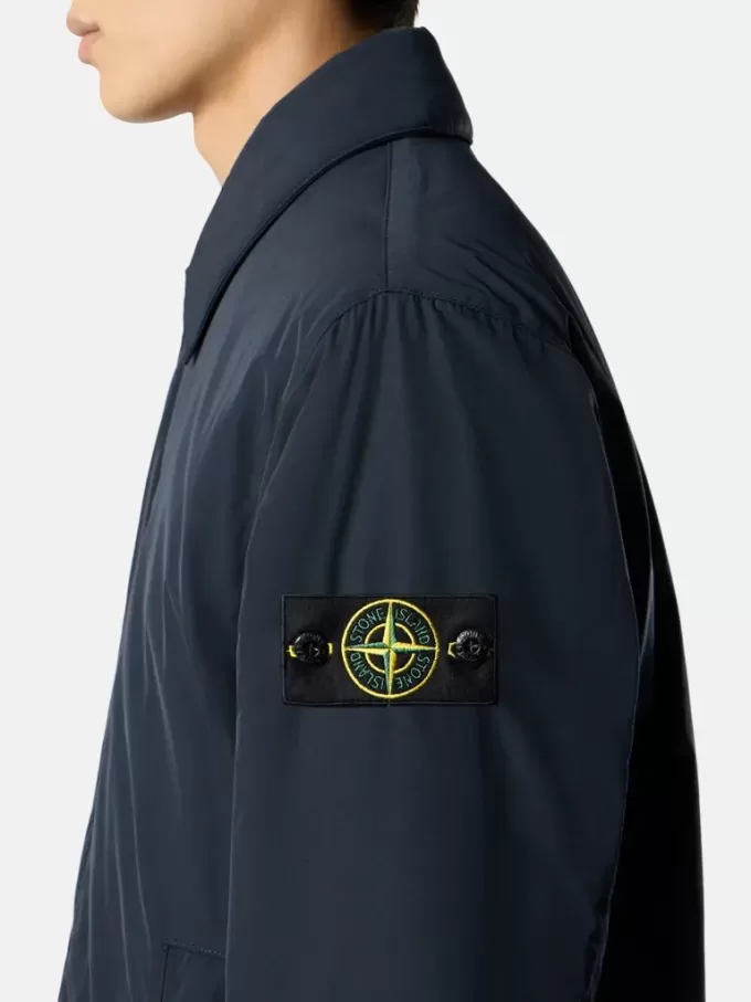 Cappotto imbottito con tasche antiscivolo e con bottoni a pressione Cappotto imbottito con tasche antiscivolo e con bottoni a pressione
