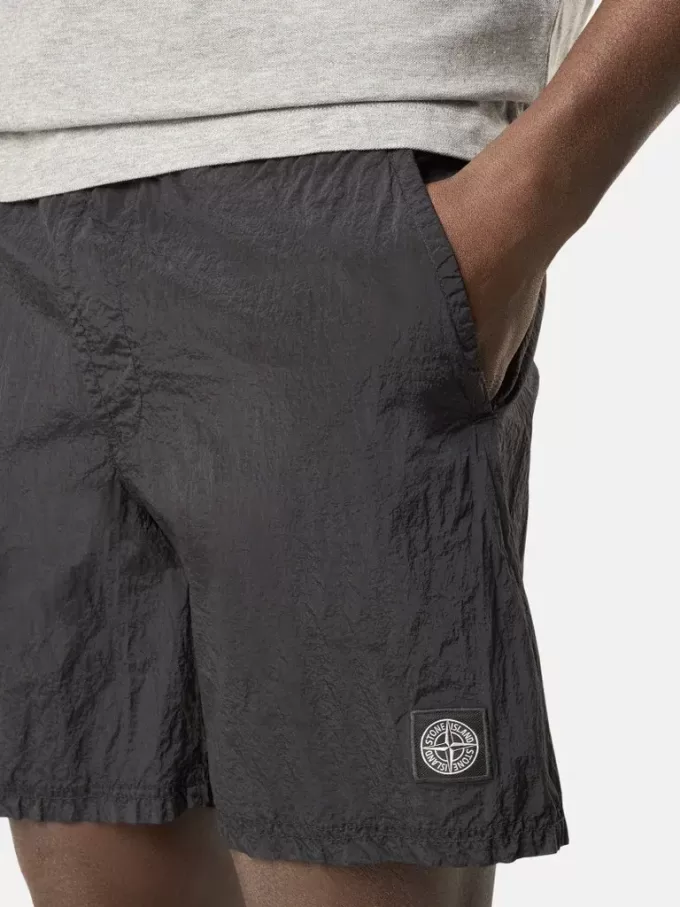 Costume da bagno di media lunghezza con vestibilità regolare e tasche Costume da bagno di media lunghezza con vestibilità regolare e tasche