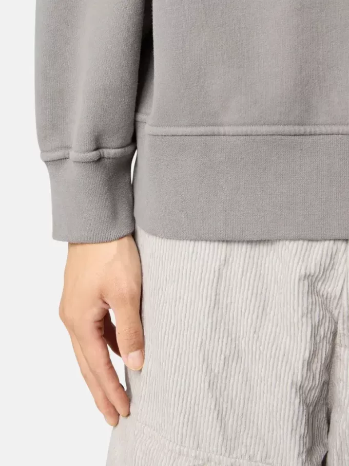 Felpa oversize con cappuccio e maniche raglan. Felpa oversize con cappuccio e maniche raglan.