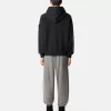 Felpa oversize con cappuccio e maniche raglan. Felpa oversize con cappuccio e maniche raglan.
