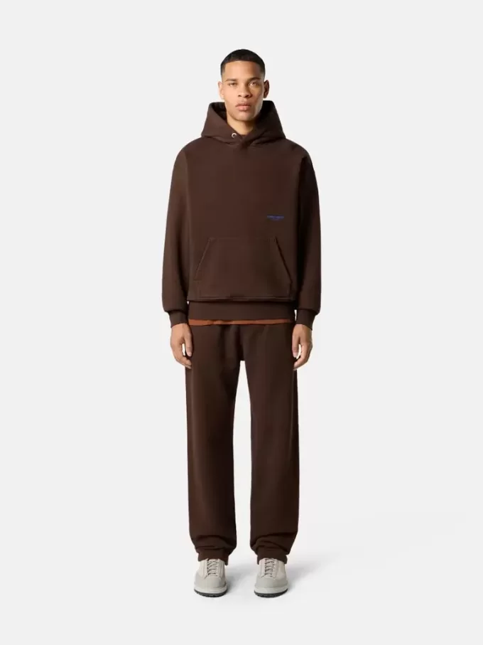 Felpa oversize con cappuccio e tasca a marsupio.