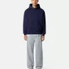 Felpa oversize con cappuccio e tasca a marsupio.