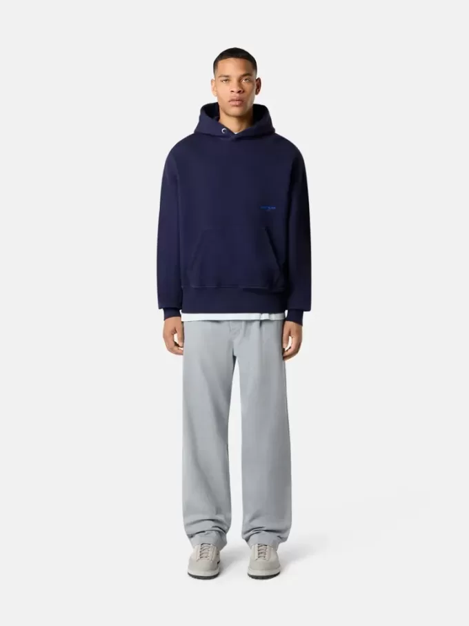 Felpa oversize con cappuccio e tasca a marsupio.