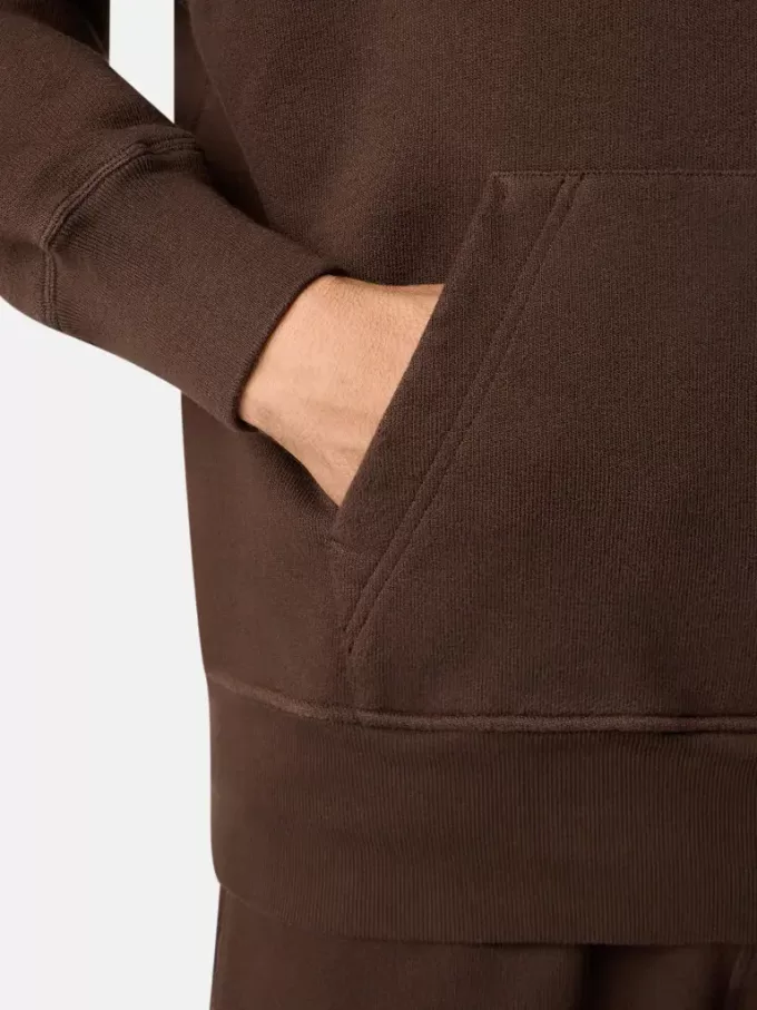 Felpa oversize con cappuccio e tasca a marsupio.