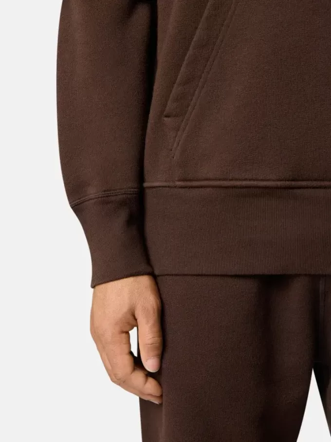 Felpa oversize con cappuccio e tasca a marsupio.