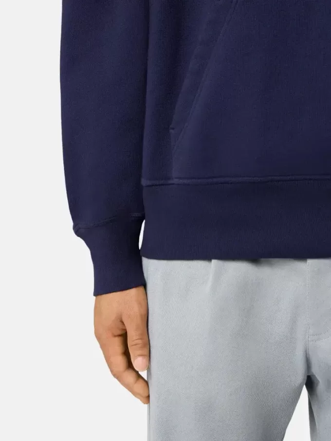 Felpa oversize con cappuccio e tasca a marsupio.