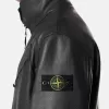 Giacca coach con fodera imbottita e tasche con bottoni a pressione Giacca coach con fodera imbottita e tasche con bottoni a pressione