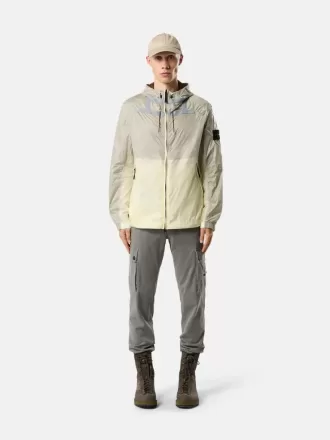 Giacca leggera con cappuccio, dettagli antiscivolo e riflettenti Giacca leggera con cappuccio, dettagli antiscivolo e riflettenti