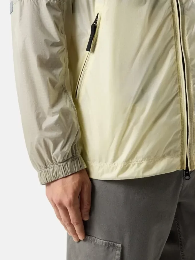 Giacca leggera con cappuccio, dettagli antiscivolo e riflettenti Giacca leggera con cappuccio, dettagli antiscivolo e riflettenti