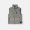 Gilet in piuma con tunnel senza cuciture e trattamento anti-caduta.