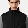 Gilet in piuma con tunnel senza cuciture e trattamento anti-caduta. Gilet in piuma con tunnel senza cuciture e trattamento anti-caduta.