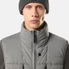 Gilet in piuma con tunnel senza cuciture e trattamento anti-caduta.