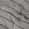 Gilet in piuma con tunnel senza cuciture e trattamento anti-caduta.