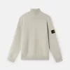Maglione a collo alto con bordi a costine