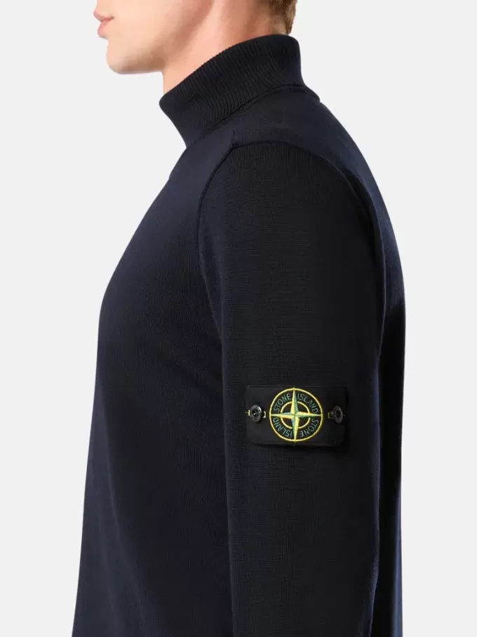 Maglione a collo alto con bordi a costine