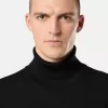 Maglione a collo alto con bordi a costine