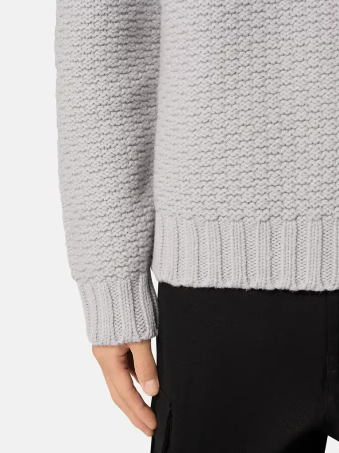 Maglione con collo alto e ampie rifiniture a coste