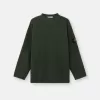 Maglione con collo alto e dettagli a cuciture rovesciate