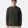 Maglione con collo alto e dettagli a cuciture rovesciate