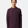 Maglione con collo alto e dettagli a cuciture rovesciate