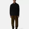 Maglione con collo alto e dettagli a cuciture rovesciate