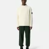Maglione con collo alto e dettagli a cuciture rovesciate