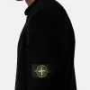 Maglione con collo alto e dettagli a cuciture rovesciate