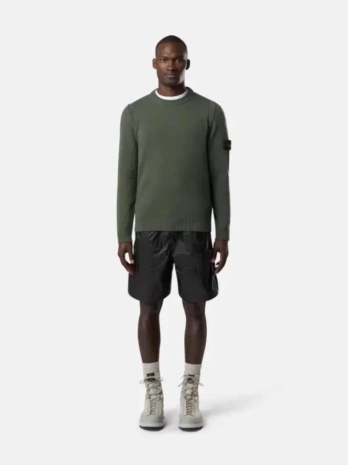 Maglione girocollo con dettagli a maglia rovesciata Maglione girocollo con dettagli a maglia rovesciata