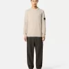 Maglione girocollo con dettagli a maglia rovesciata Maglione girocollo con dettagli a maglia rovesciata