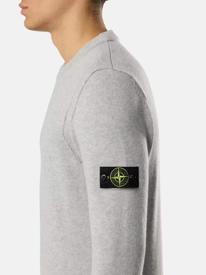 Maglione girocollo con dettagli a maglia rovesciata Maglione girocollo con dettagli a maglia rovesciata