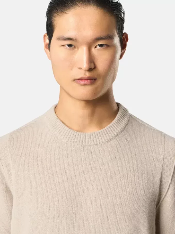 Maglione girocollo con dettagli a maglia rovesciata Maglione girocollo con dettagli a maglia rovesciata