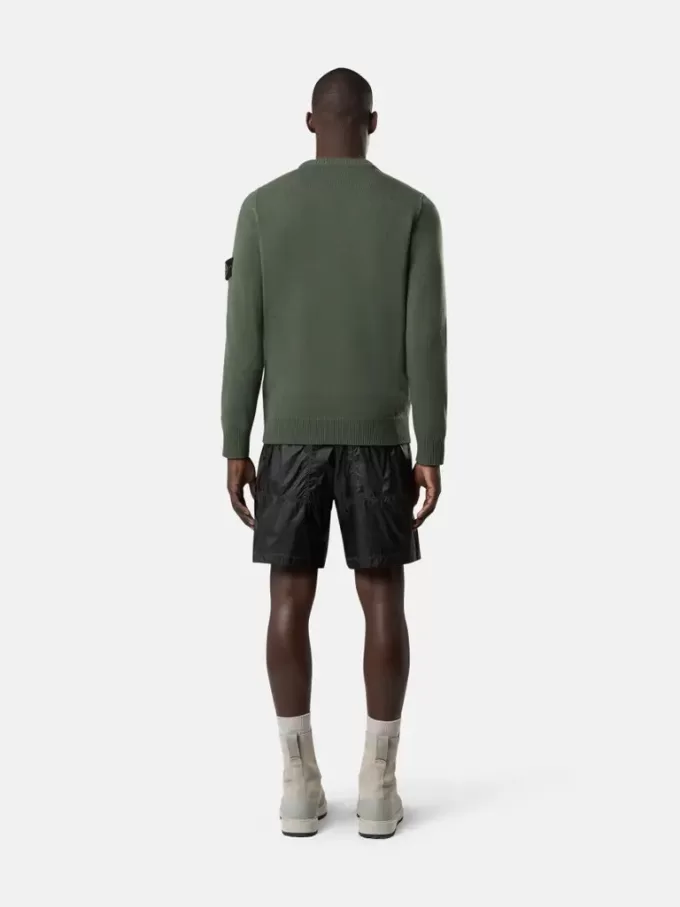 Maglione girocollo con dettagli a maglia rovesciata Maglione girocollo con dettagli a maglia rovesciata