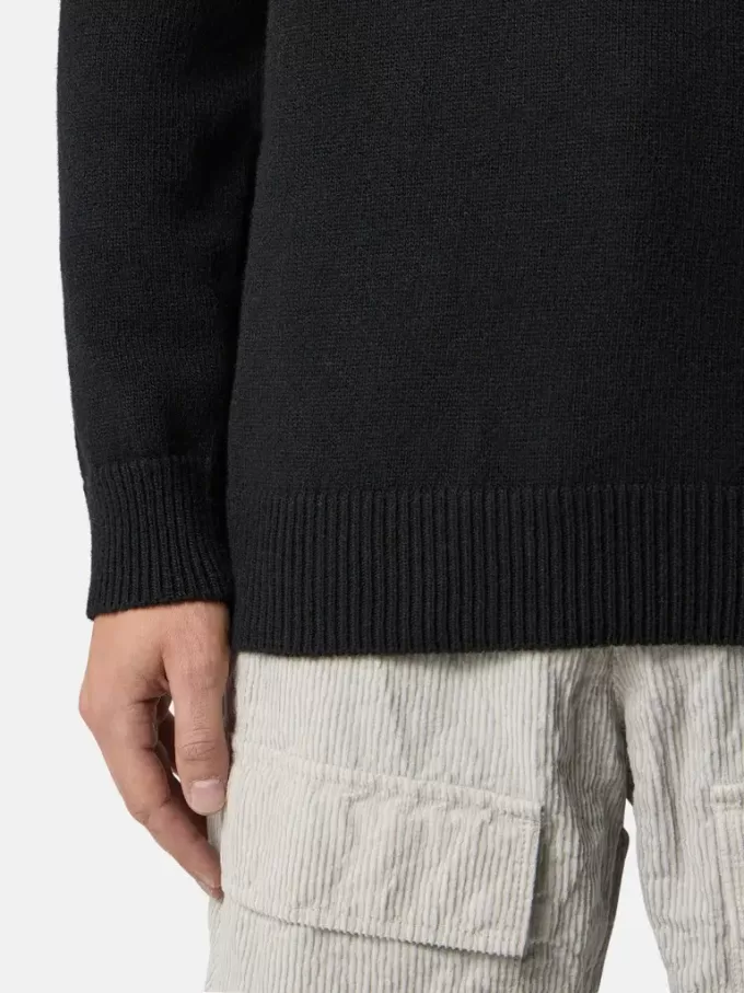 Maglione girocollo con dettagli a maglia rovesciata Maglione girocollo con dettagli a maglia rovesciata