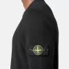 Maglione girocollo con piccoli dettagli arrotolati Maglione girocollo con piccoli dettagli arrotolati