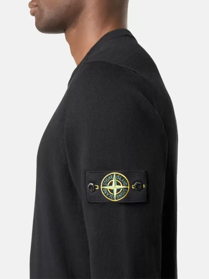 Maglione girocollo con piccoli dettagli arrotolati Maglione girocollo con piccoli dettagli arrotolati