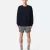 Pantaloncini da bagno slim fit con tasche e fodera in rete Pantaloncini da bagno slim fit con tasche e fodera in rete