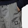 Pantaloncini da bagno slim fit con tasche e fodera in rete Pantaloncini da bagno slim fit con tasche e fodera in rete