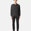 Pantaloni cargo skinny con tasche a scatto
