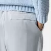 Pantaloni della tuta dal taglio ampio con tasche con bottone a pressione e cerniera
