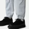 Pantaloni della tuta dal taglio ampio con tasche con bottone a pressione e cerniera