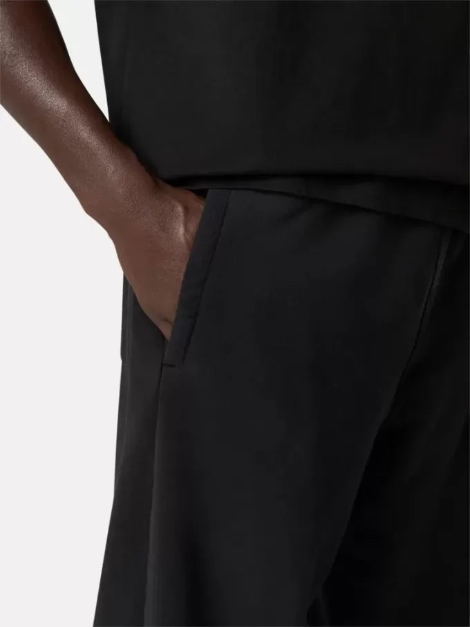 Pantaloni della tuta dalla vestibilità ampia con tasche e polsini elasticizzati Pantaloni della tuta dalla vestibilità ampia con tasche e polsini elasticizzati