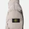 Piumino con tasche anti-caduta e bottoni a pressione Piumino con tasche anti-caduta e bottoni a pressione