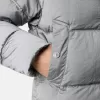 Piumino con tasche anti-caduta e bottoni a pressione Piumino con tasche anti-caduta e bottoni a pressione