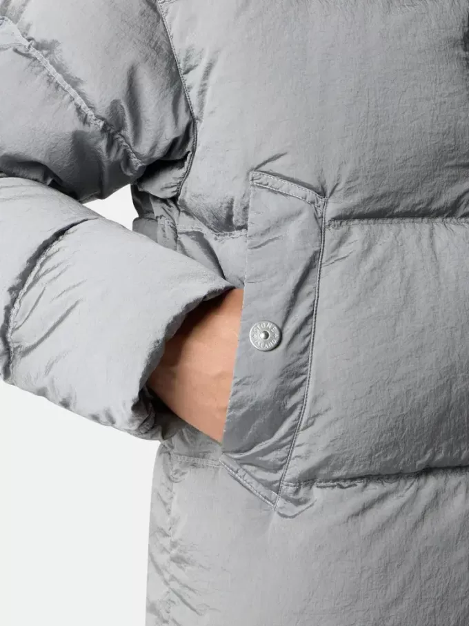 Piumino con tasche anti-caduta e bottoni a pressione Piumino con tasche anti-caduta e bottoni a pressione