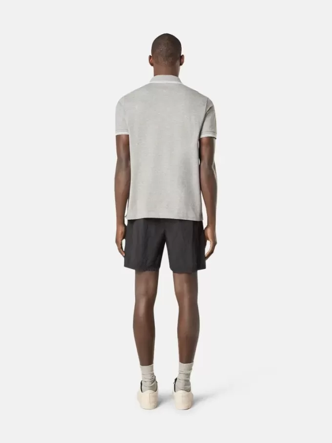 Polo slim fit a maniche corte con dettagli a righe