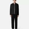 Polo slim fit a maniche corte con toppa Compass