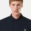 Polo slim fit a maniche corte con toppa Compass